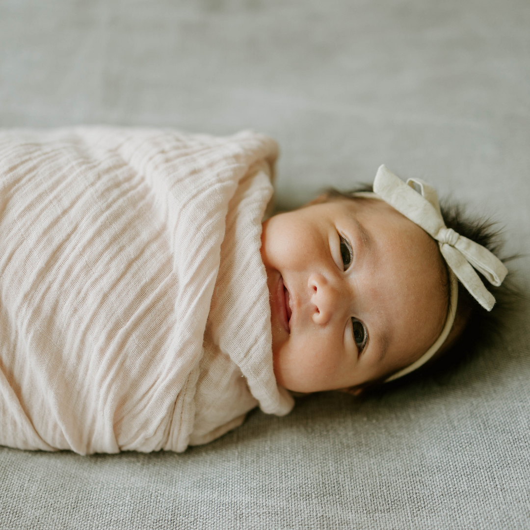 Rosie muslin baby blankets from Little Unicorn, cozy Organic Cotton Muslin Swaddle Blanket.