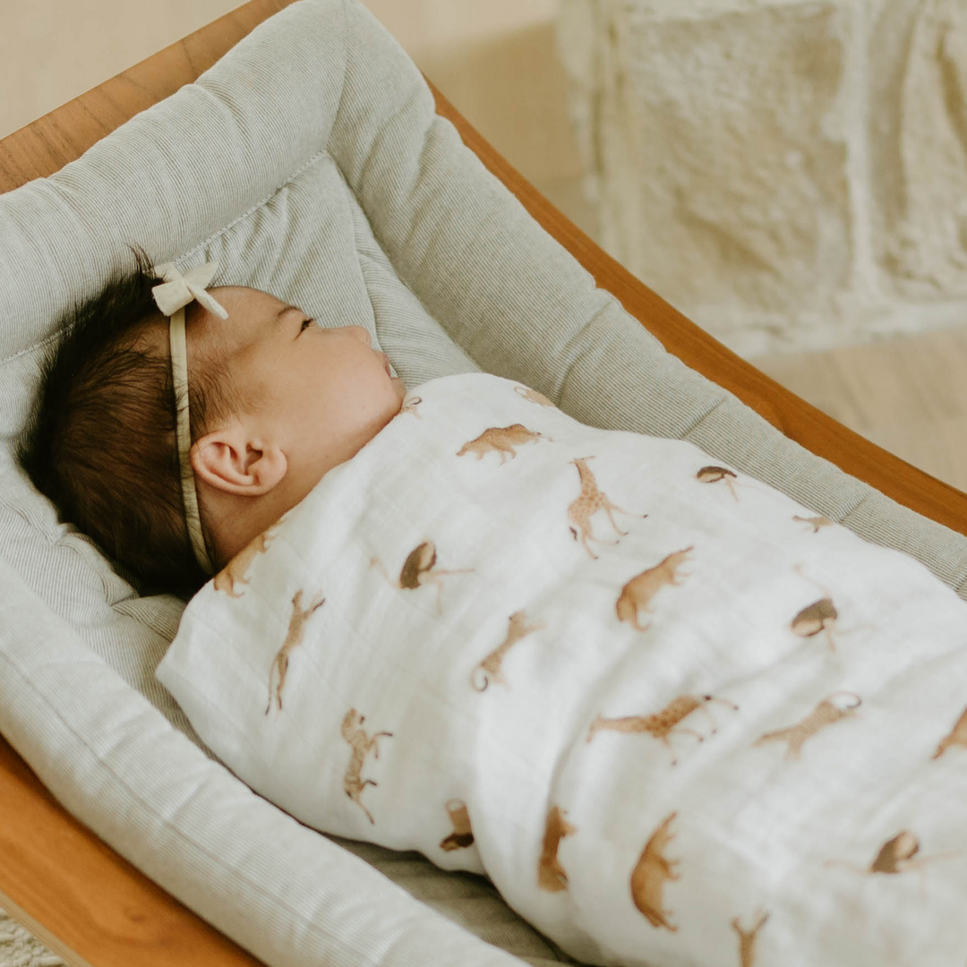 Animal Crackers muslin baby blankets from Little Unicorn, cozy Organic Cotton Muslin Swaddle Blanket.
