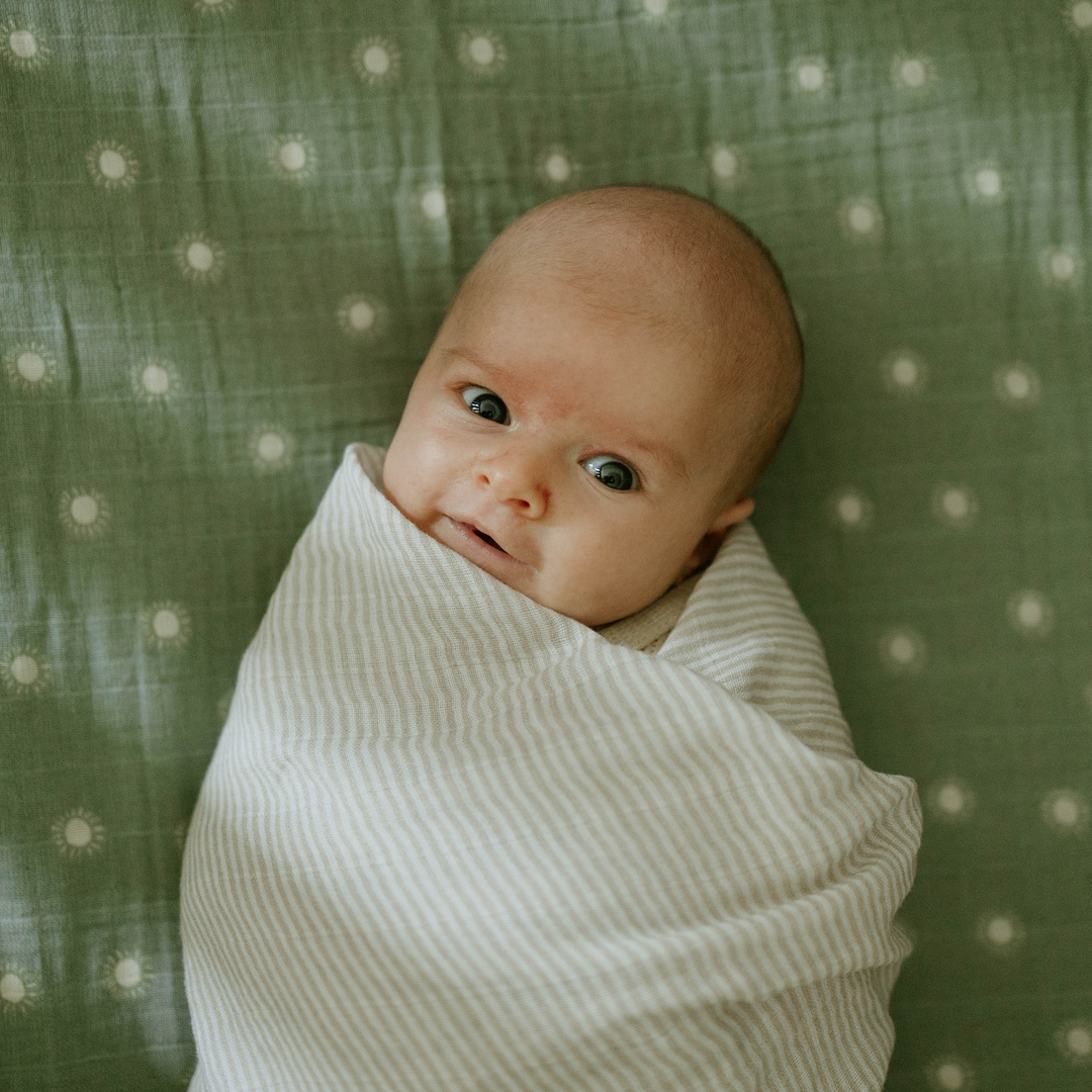 Little Unicorn Organic Cotton Muslin Swaddle Blanket in Sand Stripe, versatile swaddle cloth muslin.