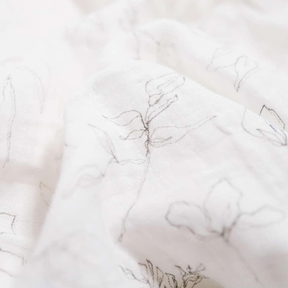 Wrap your baby in comfort with Little Unicorn Pencil Floral Muslin Swaddle, perfect muslin blankets.