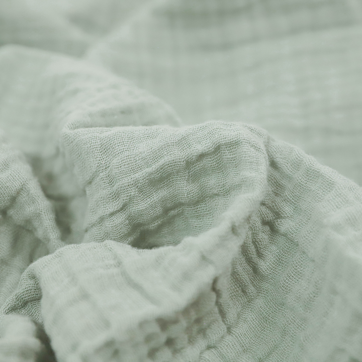 Soft and breathable Little Unicorn White Sage swaddle, ideal infant muslin blankets for cozy wrapping