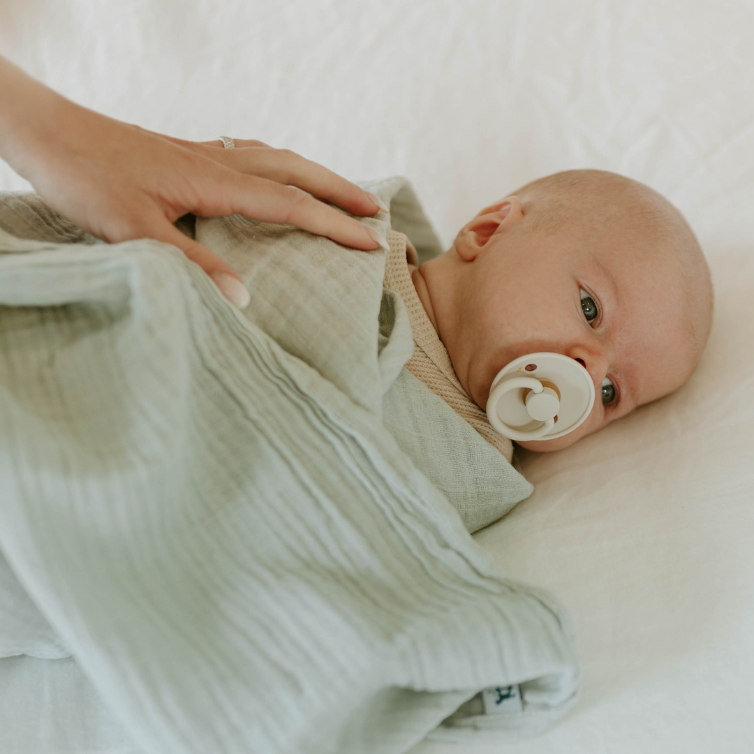 Little Unicorn baby blanket in White Sage, gentle muslin swaddle for everyday use