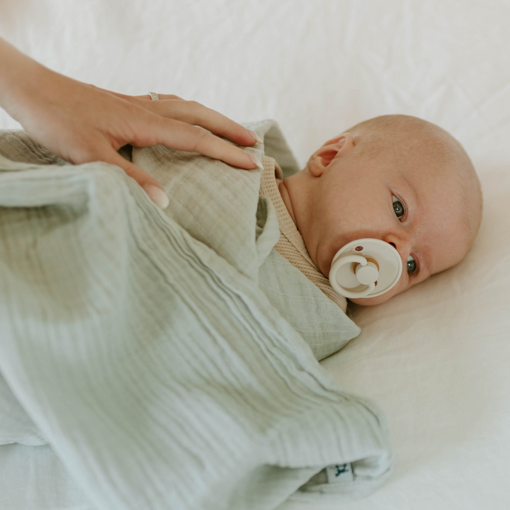 Little Unicorn baby blanket in White Sage, gentle muslin swaddle for everyday use