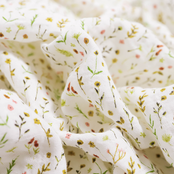 Wrap your baby in comfort with Little Unicorn Floral Field Muslin Swaddle, perfect muslin blankets.