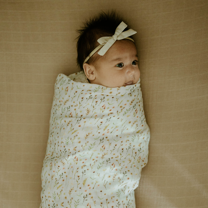 Soft and breathable muslin for swaddling, Little Unicorn Organic Cotton Floral Field Swaddle Blanket.