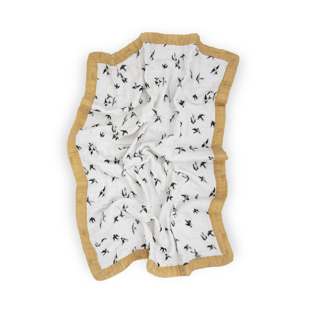 Beautifully crafted Little Unicorn Organic Cotton Muslin Baby Quilt - Swallows, designed from gentle organic cotton for a lightweight muslin quilt.