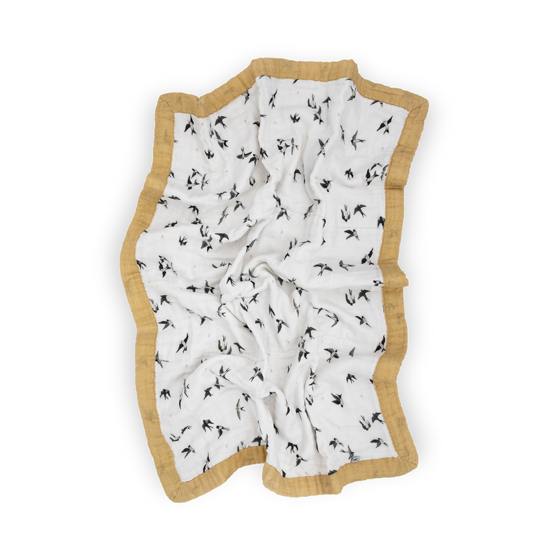 Beautifully crafted Little Unicorn Organic Cotton Muslin Baby Quilt - Swallows, designed from gentle organic cotton for a lightweight muslin quilt.