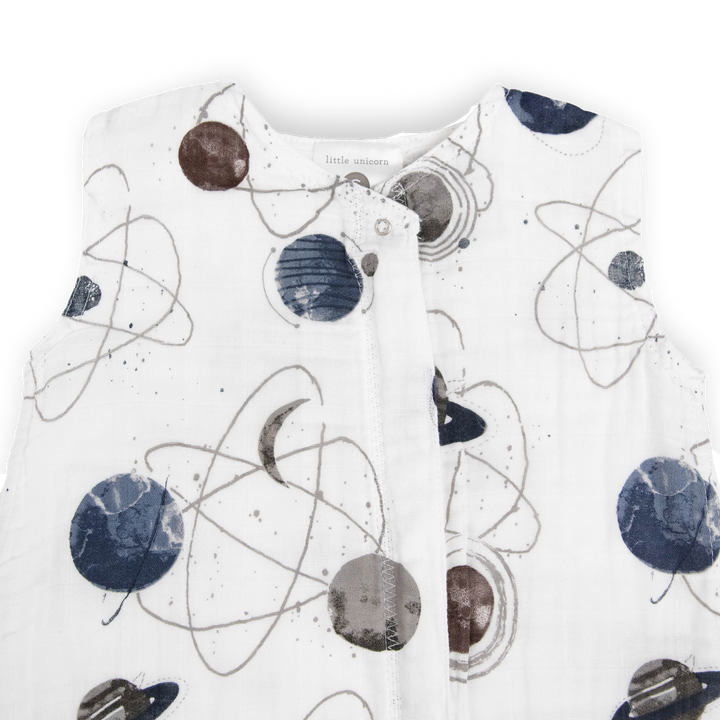 Close-up of Little Unicorn Cotton Muslin Sleep Bag - Planetary showing soft fabric and star pattern, perfect baby sleeping bag.