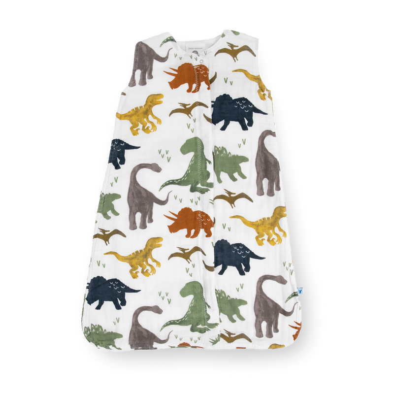Little Unicorn Cotton Muslin Sleep Bag - Dino Friends, a cozy baby sleeping bag for safe naps.