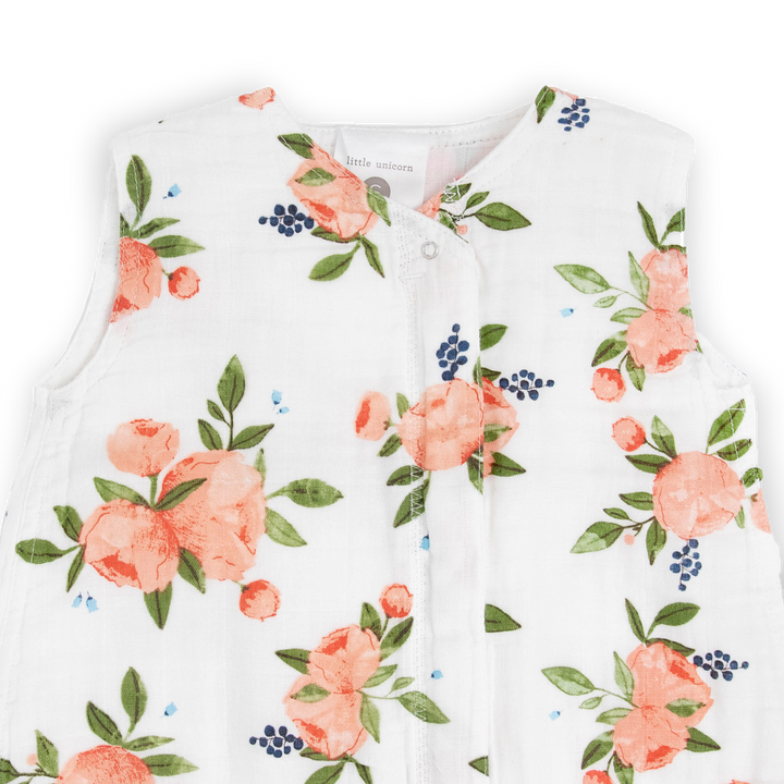 Close-up of Little Unicorn Cotton Muslin Sleep Bag - Watercolor Roses, breathable fabric perfect as a baby sleeping bag.