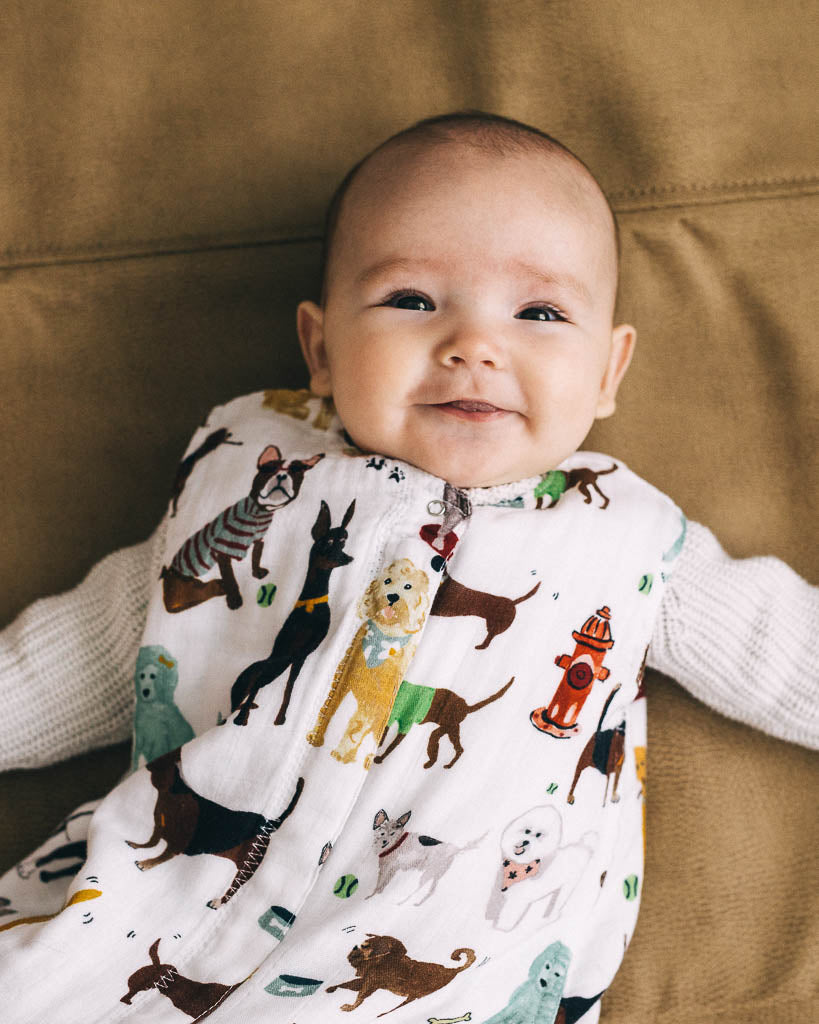 Little Unicorn Cotton Muslin Sleep Bag - Woof with cozy muslin layers, ideal for a baby sleep bag during naps.