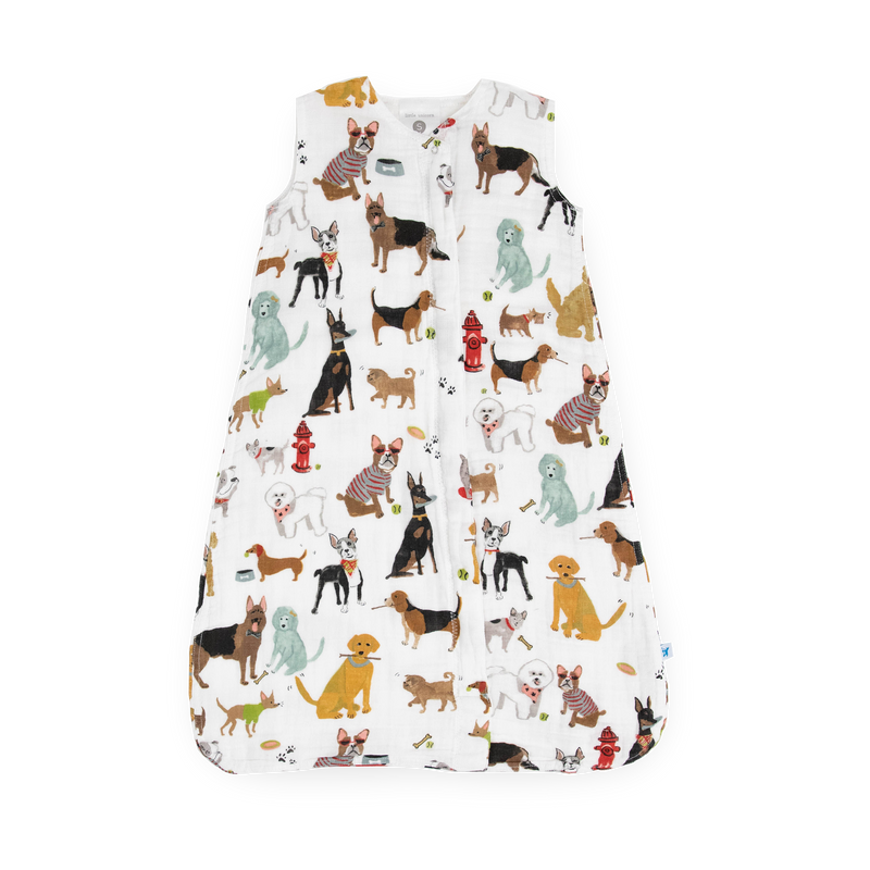 Little Unicorn Cotton Muslin Sleep Bag - Woof featuring playful dog prints, a cozy baby sleep bag for safe, comfortable naps.