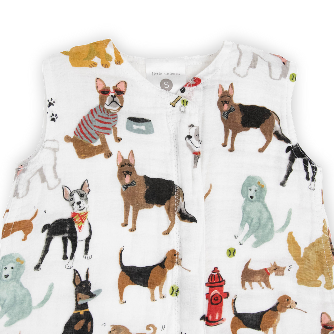 Close-up of Little Unicorn Cotton Muslin Sleep Bag - Woof showing soft breathable fabric for a gentle baby sleeping bag.