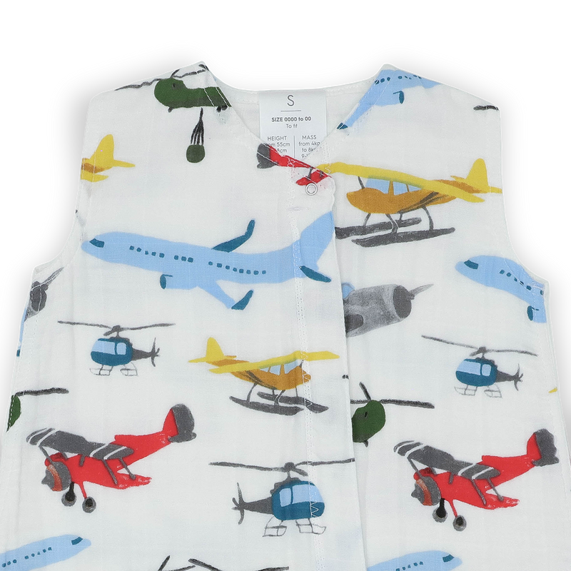 Flat lay of Little Unicorn Cotton Muslin Sleep Bag - Air Show, infant sleeping bag perfect for cozy naps.