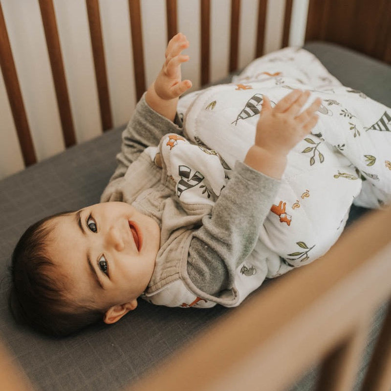 Adorable Little Unicorn Cotton Muslin Sleep Bag - Forest Friends featuring woodland prints, perfect as a sleeping bag baby essential.