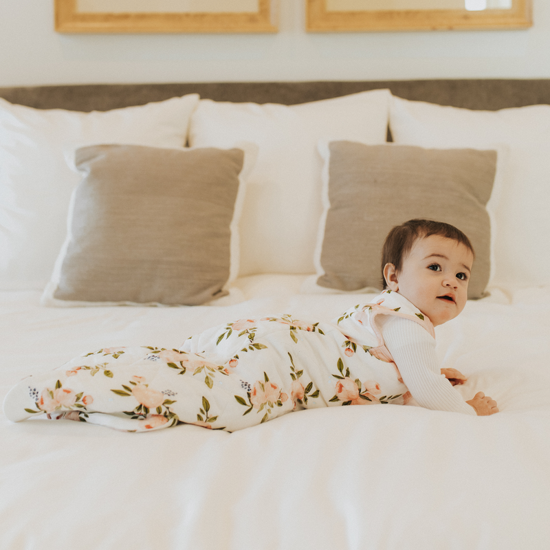 Little Unicorn Watercolor Roses baby sleeping bags, quilted comfort for overnight sleep.