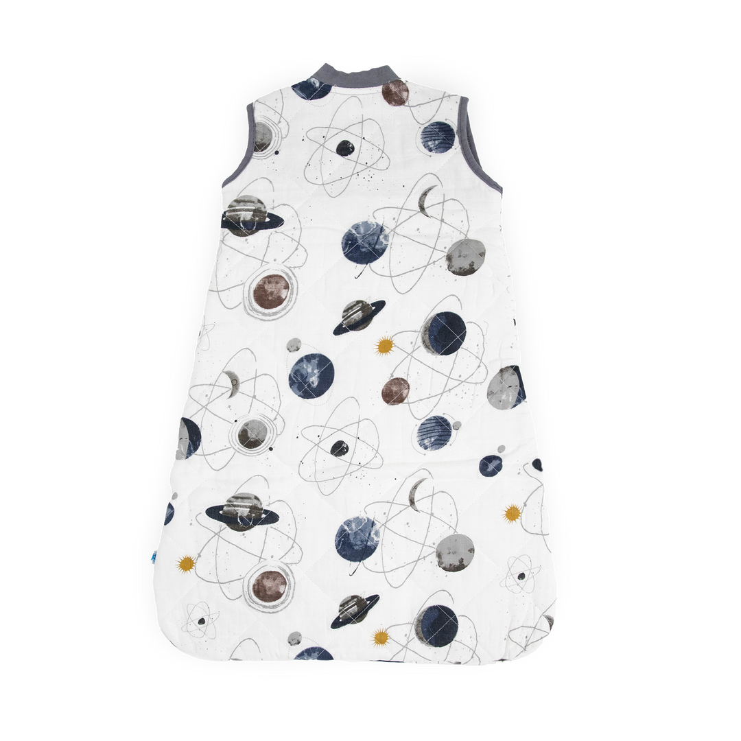 Little Unicorn Cotton Muslin Quilted Sleep Bag - Planetary laid flat, lightweight design perfect for everyday baby sleeping bags.