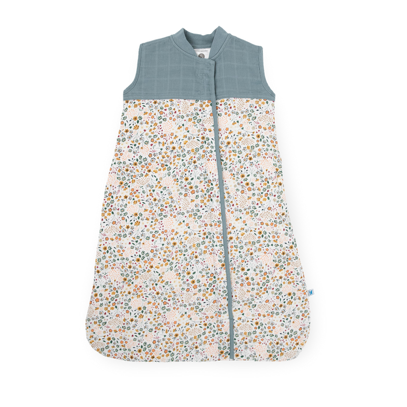 Little Unicorn Cotton Muslin Quilted Sleep Bag - Pressed Petals in soft floral print, cozy baby sleep bag for naps.