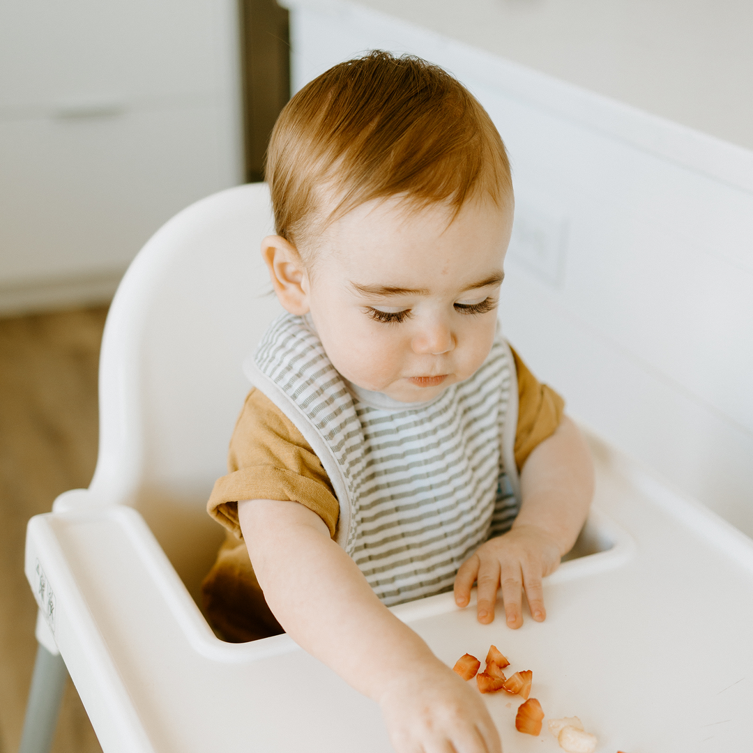 Mealtime made easy with Little Unicorn Dino Friends 2 Bibs, soft and absorbent