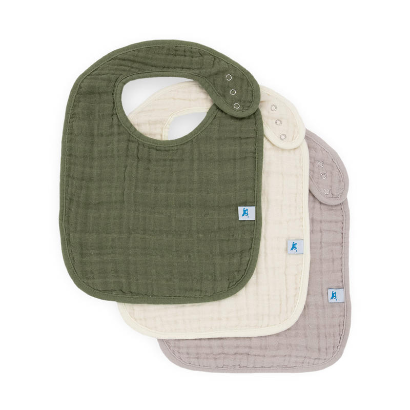 Little Unicorn Cotton Muslin Bibs in Fern 2, perfect for keeping babies clean at mealtime