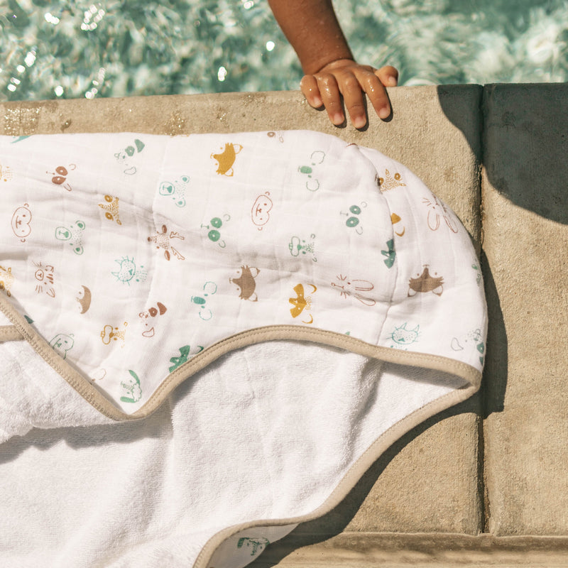 Soft baby towel with hood by Little Unicorn, Toddler Hooded Towel - Animal Crowd, ideal for post-bath snuggles