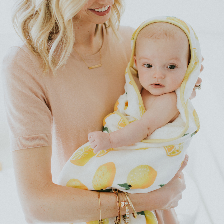 Soft baby towel with hood by Little Unicorn, Infant Hooded Towel - Lemon, ideal for post-bath snuggles
