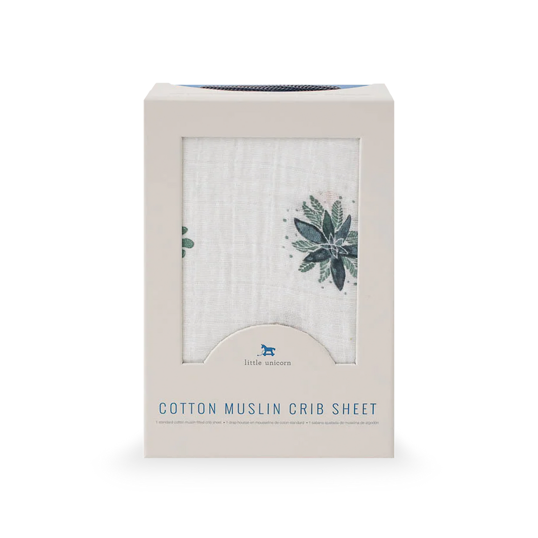 Playful cactus design on Little Unicorn Cotton Muslin Crib Sheet - Prickle Pots, ideal cotton crib sheets for modern nurseries.