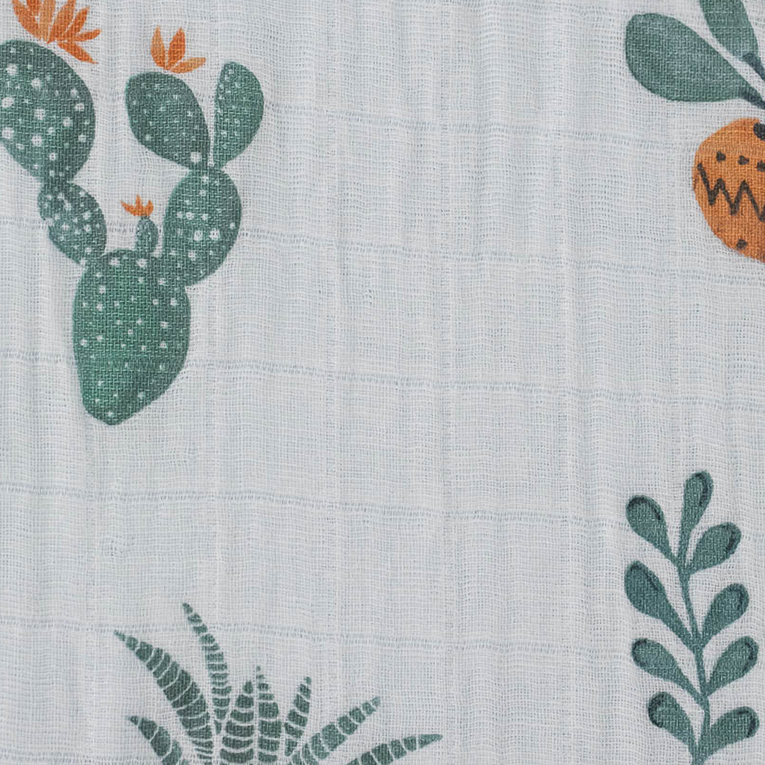 Little Unicorn Cotton Muslin Crib Sheet - Prickle Pots styled on mattress, lightweight muslin for the best crib sheets.