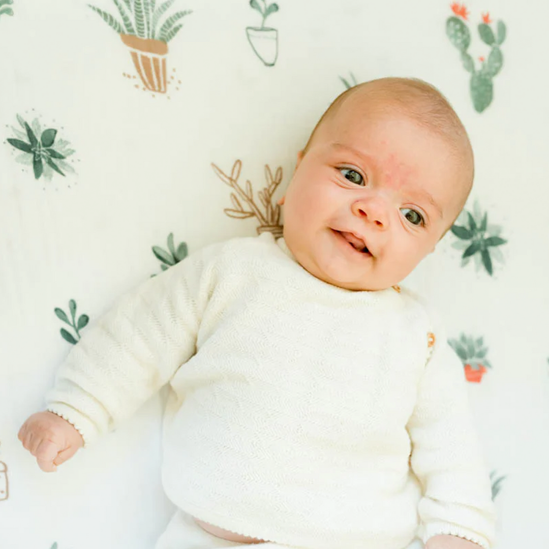 Bright cactus print Little Unicorn Cotton Muslin Crib Sheet - Prickle Pots brings desert vibes to your crib sheet set.
