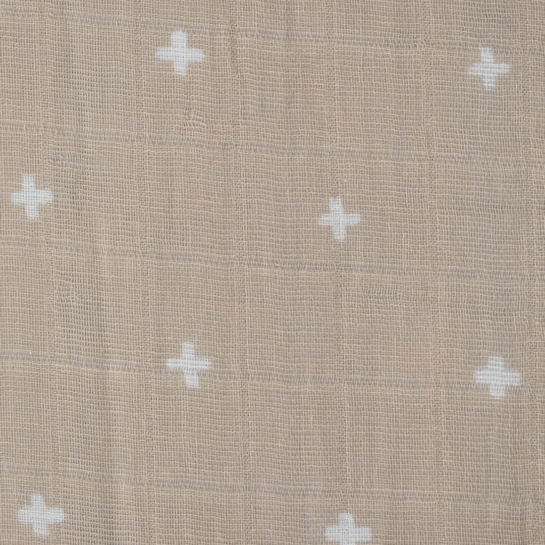 Little Unicorn Cotton Muslin Crib Sheet - Taupe Cross styled in crib, breathable and gentle cotton crib sheets.