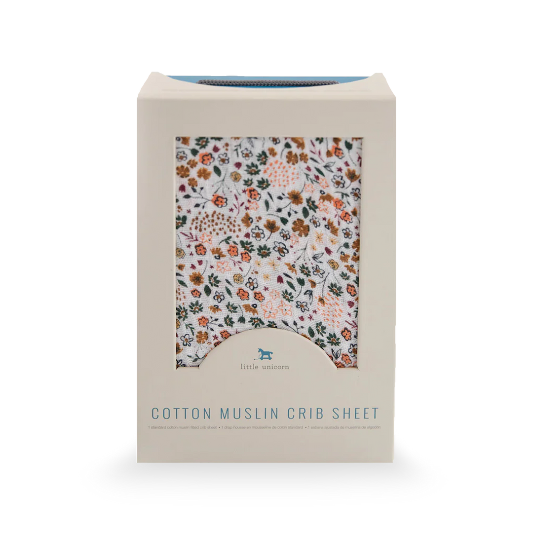 Little Unicorn Cotton Muslin Crib Sheet - Pressed Petals styled on mattress, lightweight and breathable cotton sheet for crib.