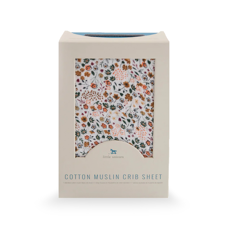 Little Unicorn Cotton Muslin Crib Sheet - Pressed Petals styled on mattress, lightweight and breathable cotton sheet for crib.
