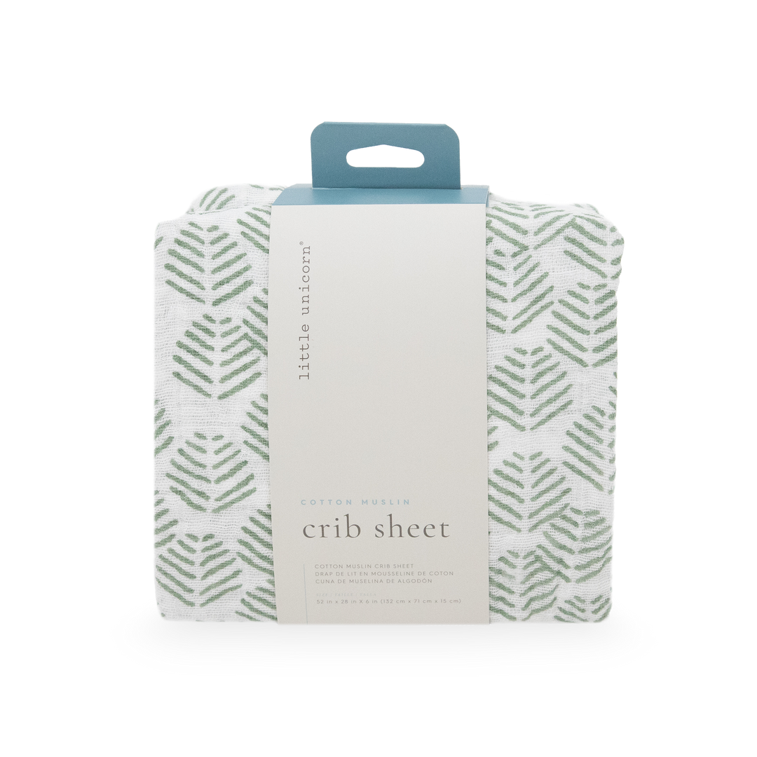 Add charm to the nursery with Little Unicorn Cotton Muslin Crib Sheet - Leaf Motif, stylish fitted crib sheets for baby beds.