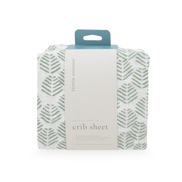 Add charm to the nursery with Little Unicorn Cotton Muslin Crib Sheet - Leaf Motif, stylish fitted crib sheets for baby beds.