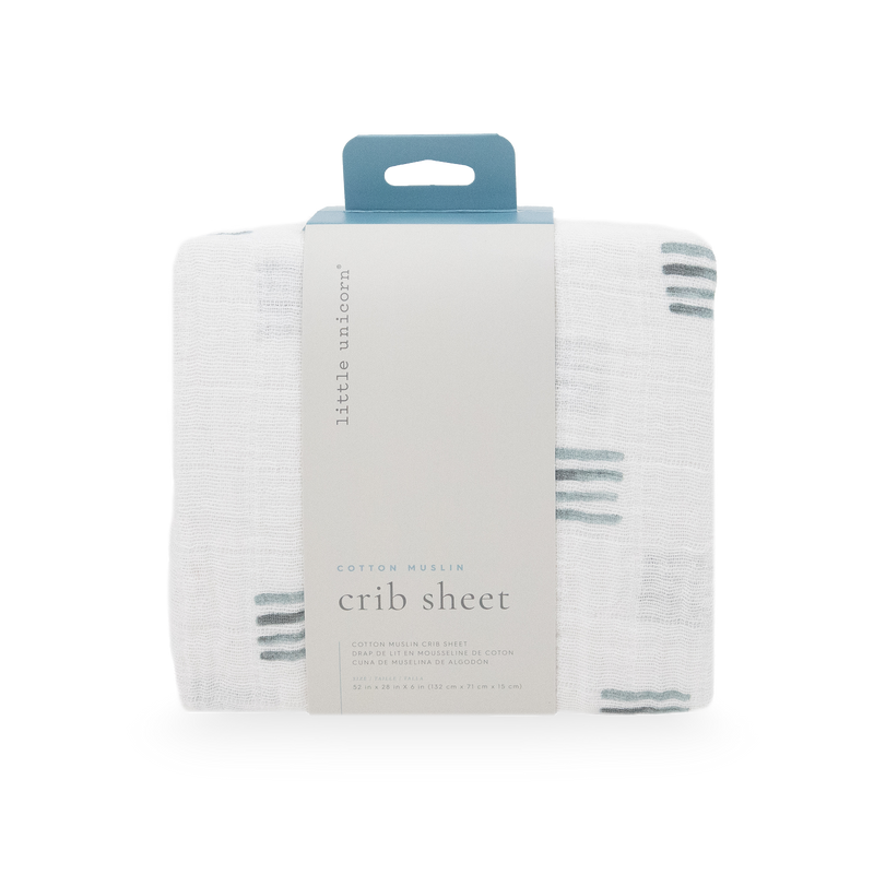 Little Unicorn Blue Stacks Cotton Muslin Crib Sheet styled on crib, one of the best crib sheets for newborns