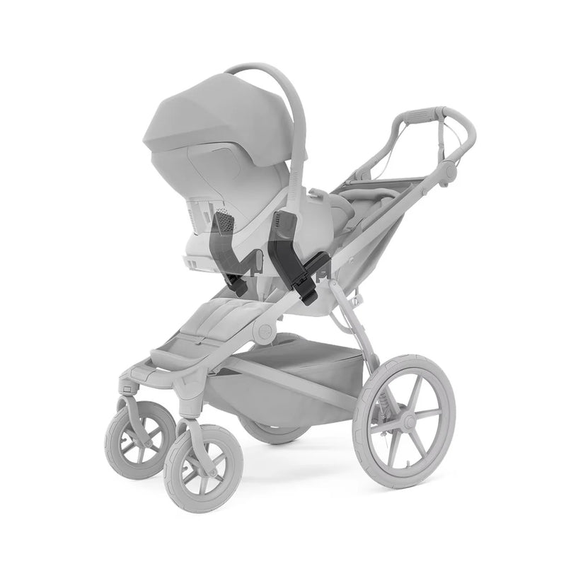 Thule Urban Glide stroller in soft beige with car seat adapters, great for easy travel.