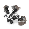 Uppababy double bundle stroller, rumbleseat, and bassinet in the color Theo