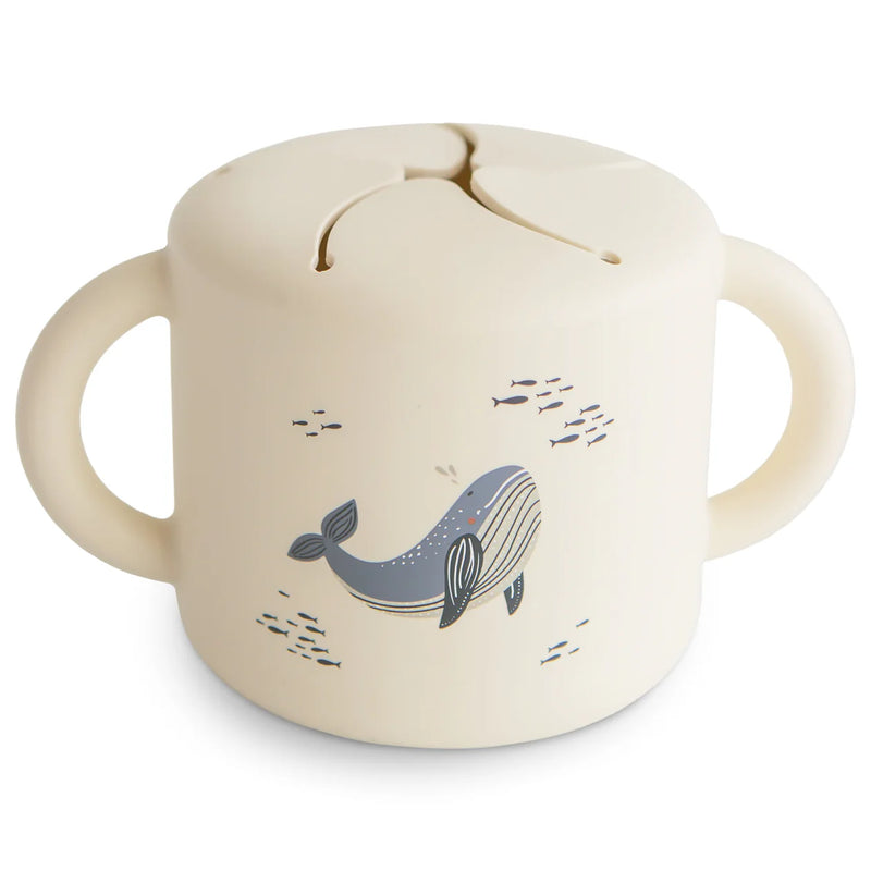 Mushie Silicone Snack Cup in Whales a charming design that adds a touch of fun to your babyÕs snacks