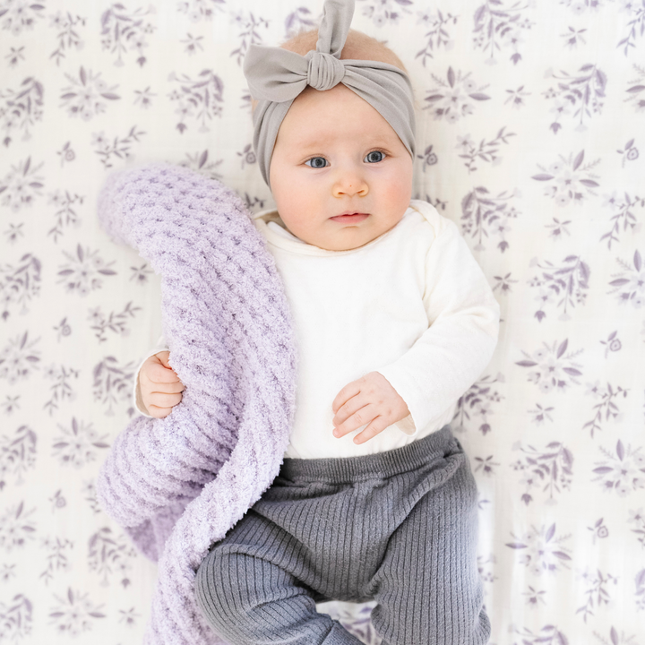 Soft loft and modern grid texture define the Wisteria Saranoni Waffle Knit Mini Blanket as perfect Baby blankets comfort.