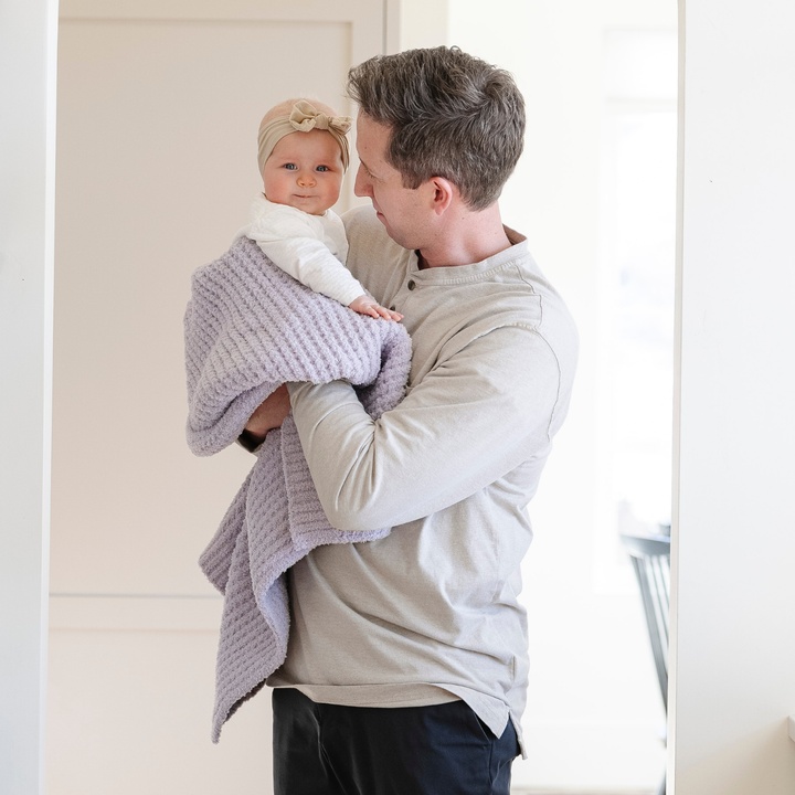 Saranoni Waffle Knit Receiving Blanket in Wisteria makes a plush baby girl blanket for cozy days.