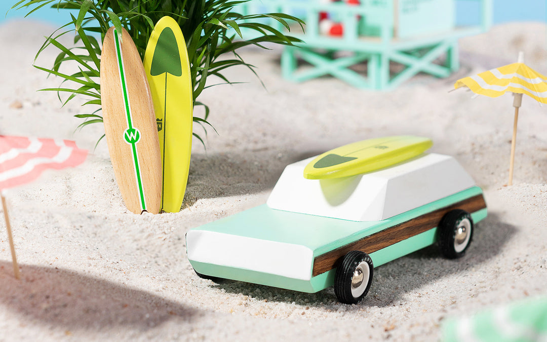 Plantoys Woodie Redux Malibu edition, a wooden toy car that makes a great toddler toy car.