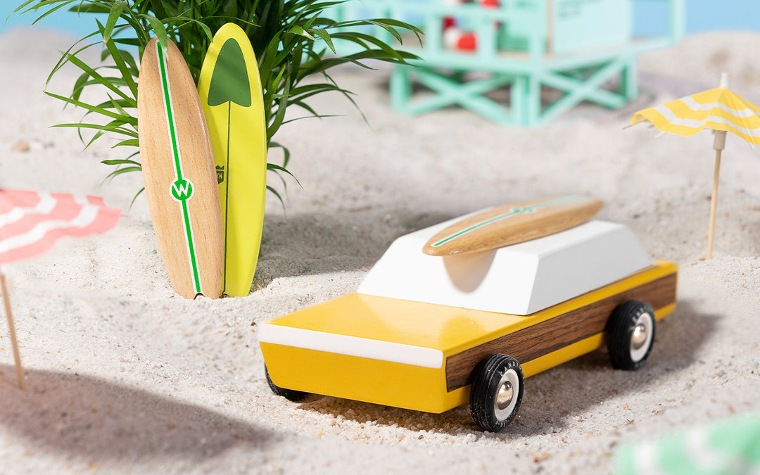 Set against a Malibu backdrop, the Plantoys Woodie brings beachy fun to fans of classic car toys.
