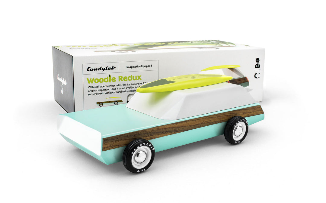 Plantoys Woodie Redux car toy shown with packaging, ideal for kids who love wooden toy cars.