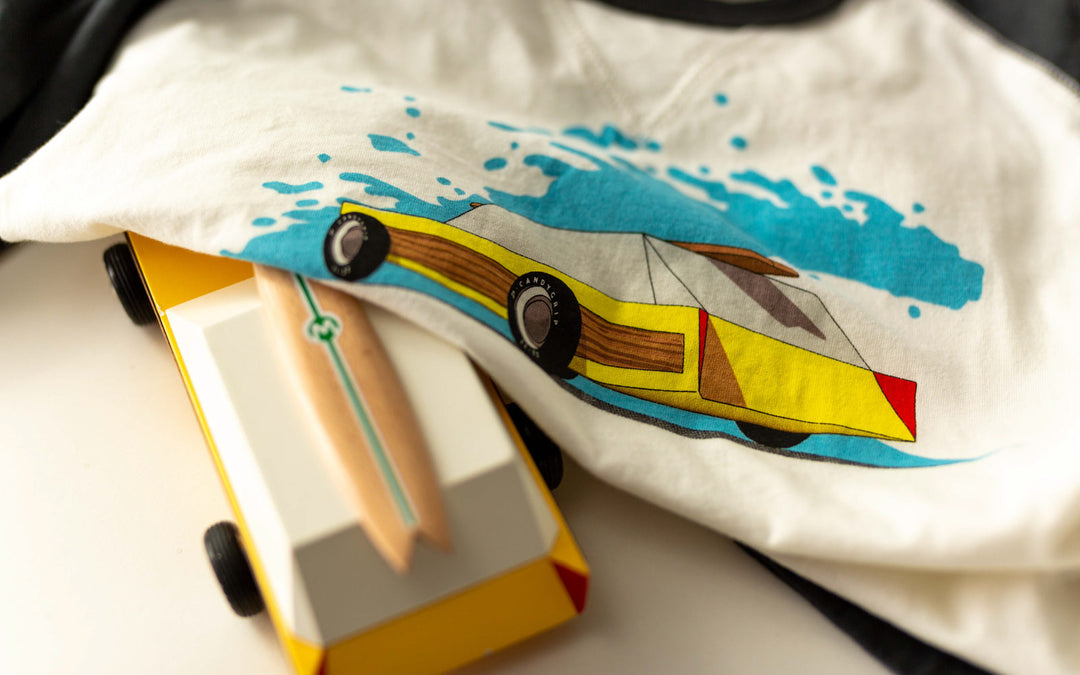Another relaxed lifestyle view showcases the Plantoys Woodie as a go-to toy car for imaginative adventures.