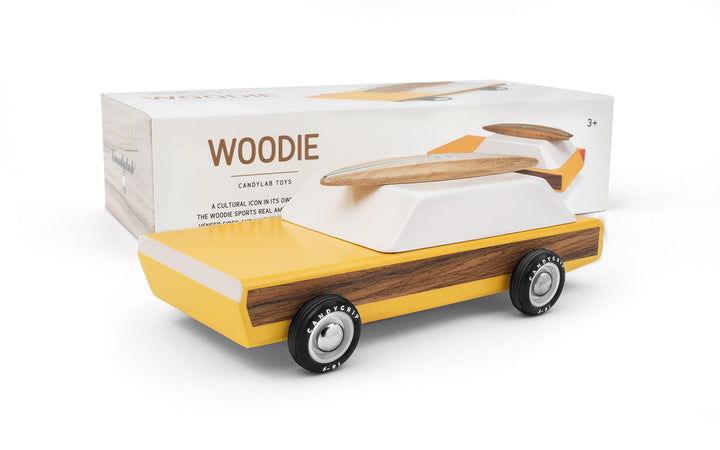 Shown with its packaging, the Plantoys Woodie makes an appealing option for families shopping for toy cars for kids.
