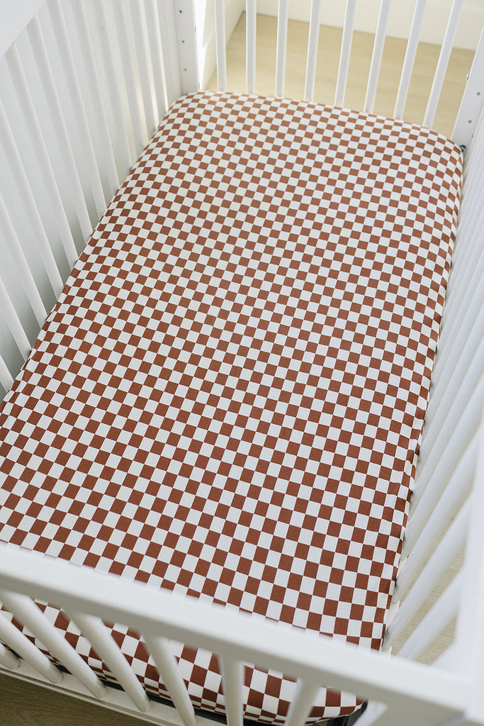 Rust Checkered Bamboo Stretch Crib Sheet by Mebie Baby in rust, soft crib sheets