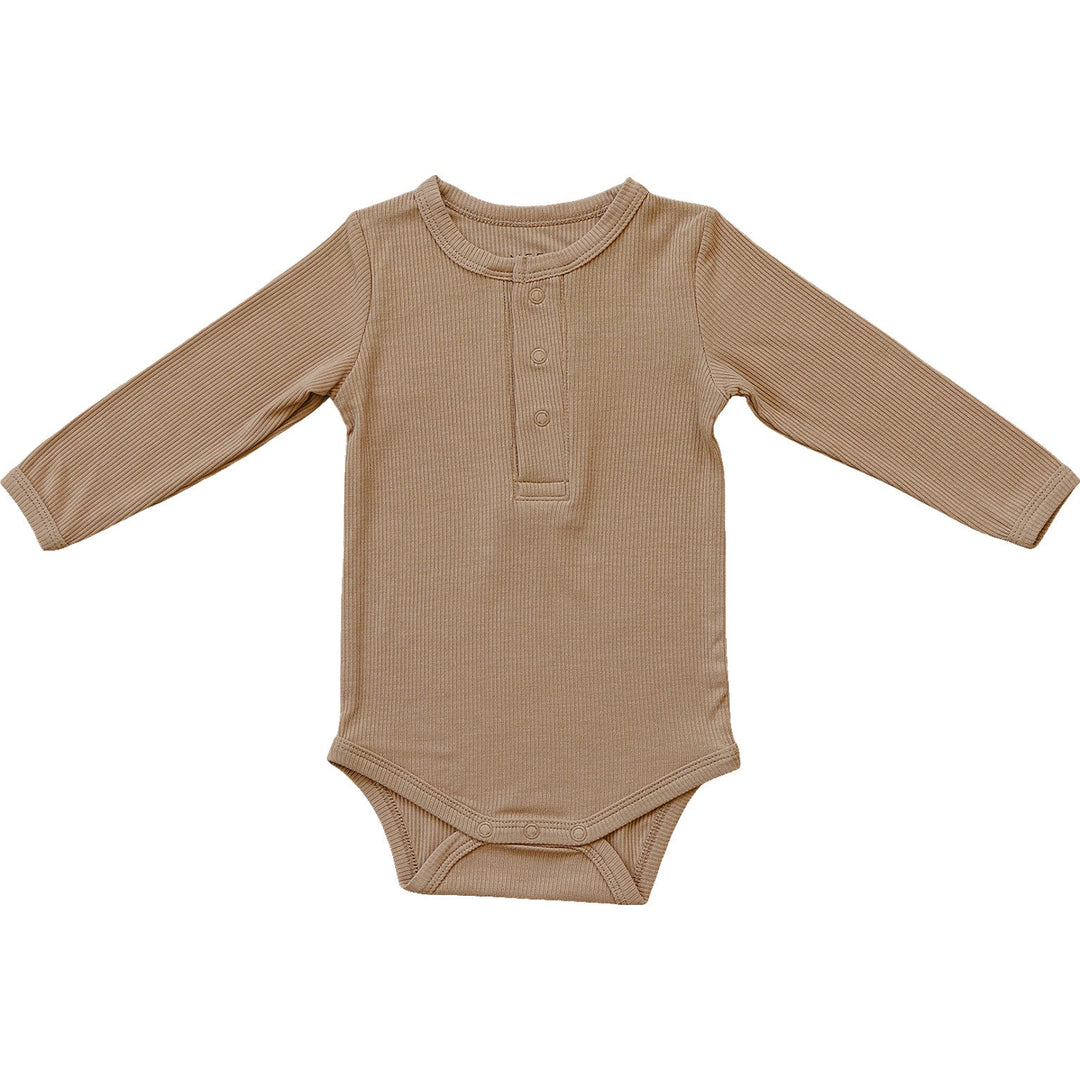 Mebie Baby Latte Bamboo Snap Long Sleeve Ribbed Bodysuit laid flat to show the fabric and design of this ribbed baby bodysuit
