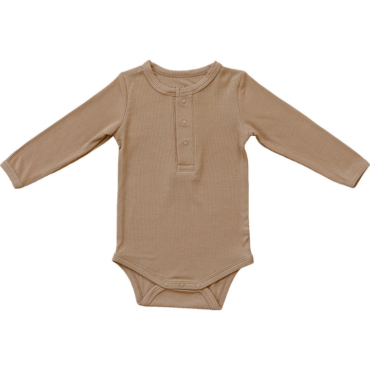 Mebie Baby Latte Bamboo Snap Long Sleeve Ribbed Bodysuit laid flat to show the fabric and design of this ribbed baby bodysuit
