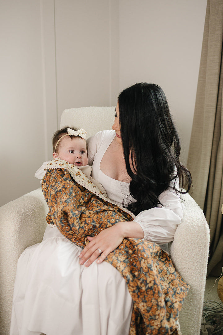 Mebie Baby Venetian Floral + Autumn Bloom Lace Muslin Quilt makes a charming kids blanket for playtime or naps.