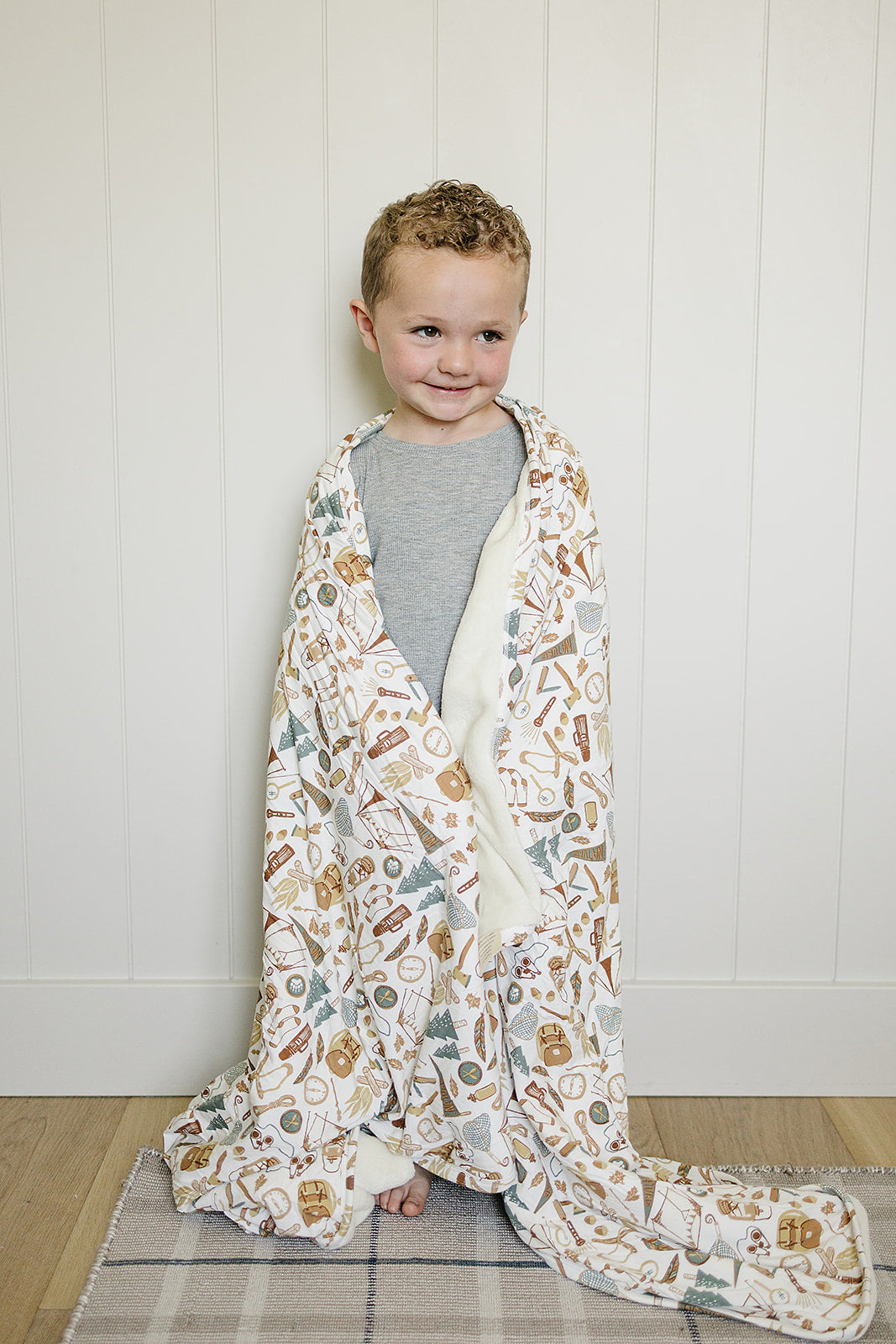 Soft and plush, the Mebie Baby Camping Trip Bamboo Fleece Quilt works as one of the best baby blankets.